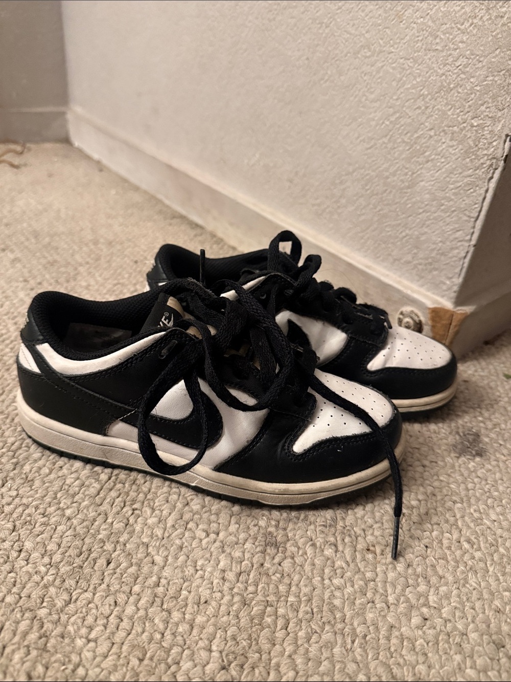 Nike Kids Black and White Low-Top Sneakers with Swoosh